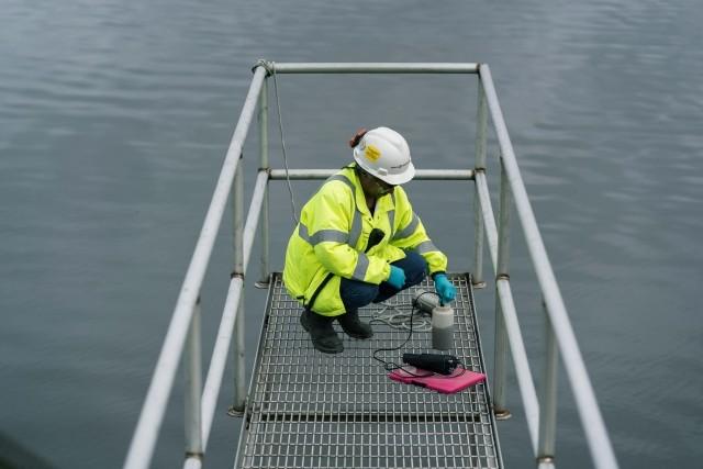 An International Paper employee performs environmental analysis.